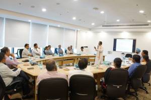 Bodhi speaks to employees at Polaris Intellect Designs